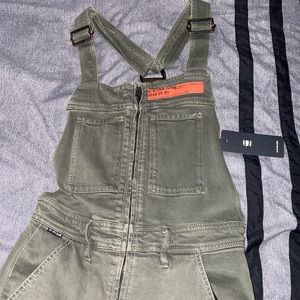 Gstar olive green overall. Size xsmall fits like a small. Brand new with tags.